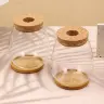 Стеклянная ваза с деревянной подставкой для растений