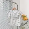 Детский водонепроницаемый нагрудник с рукавами